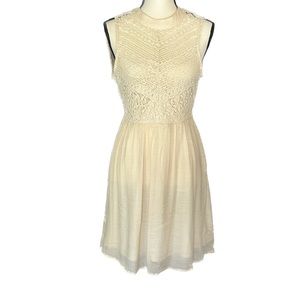 Chelsea & Violet Sleeveless Cream-colored Fit and Flare Mini Dress